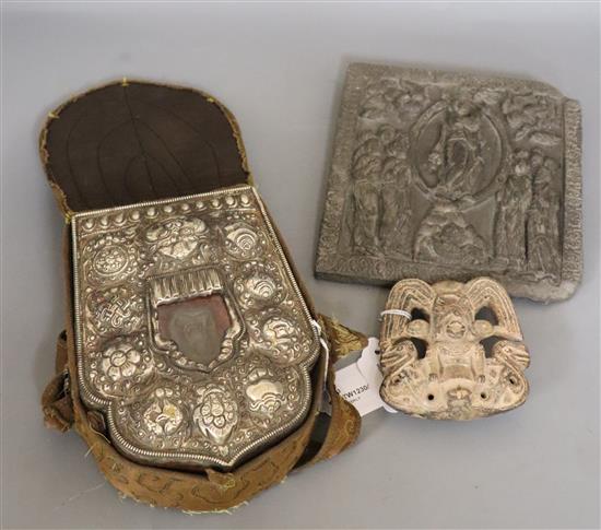 A Tibetan Ghau prayer box, white metal-mounted with inset figure of Buddha, in silk carrying case and two other items,